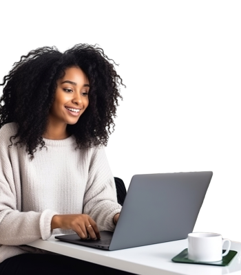Junge Frau sitzt am Laptop - Homeoffice